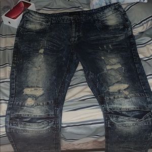 Distressed denim jeans